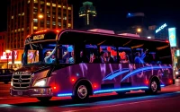 Group of friends enjoying a ride in a macon party bus illuminated with festive lights.